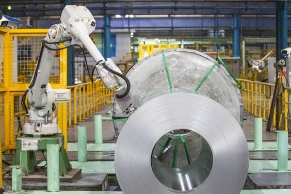 Robot handling a steel coil